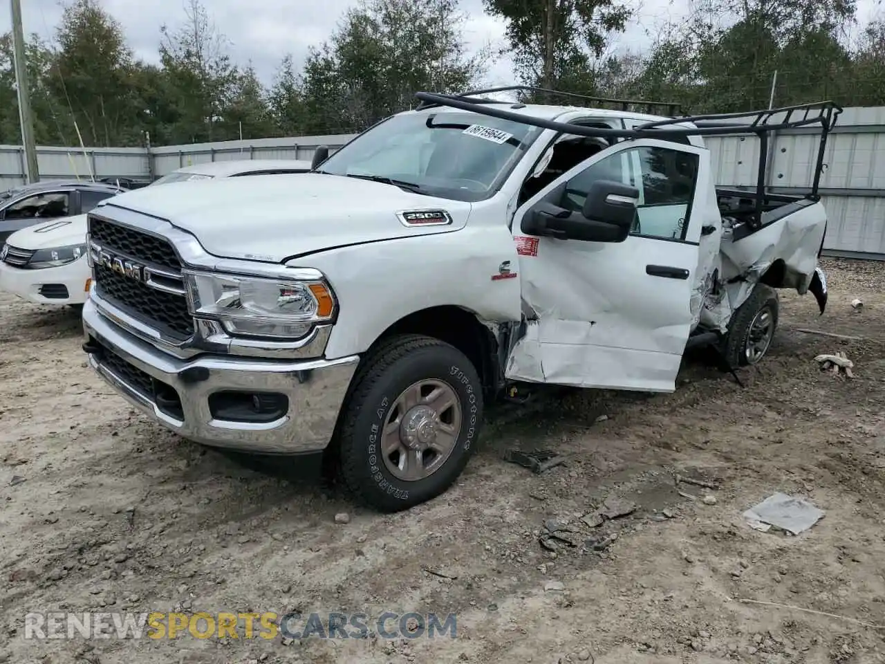 1 Photograph of a damaged car 3C6UR5CLXRG194675 RAM 2500 2024