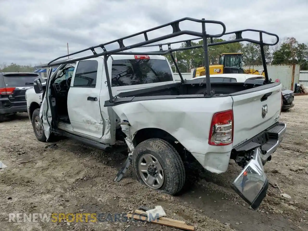 2 Photograph of a damaged car 3C6UR5CLXRG194675 RAM 2500 2024