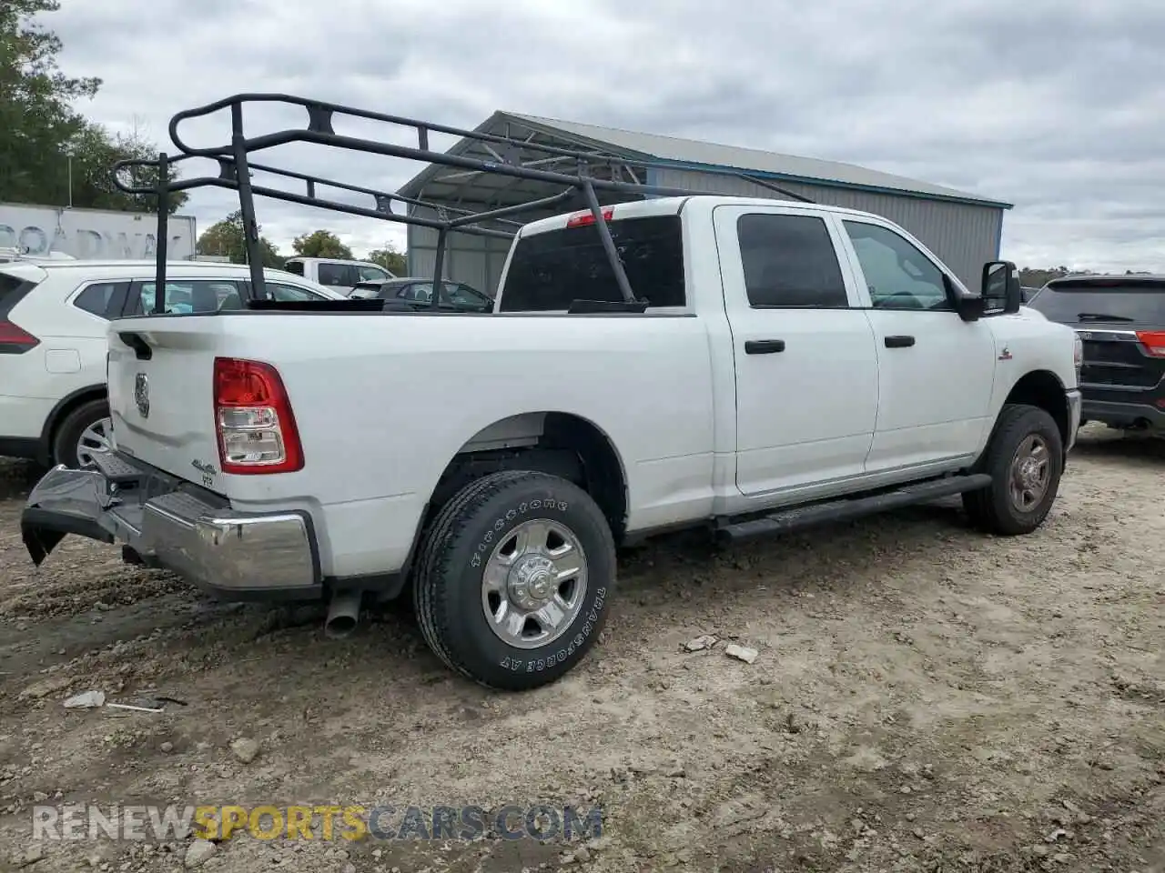 3 Photograph of a damaged car 3C6UR5CLXRG194675 RAM 2500 2024