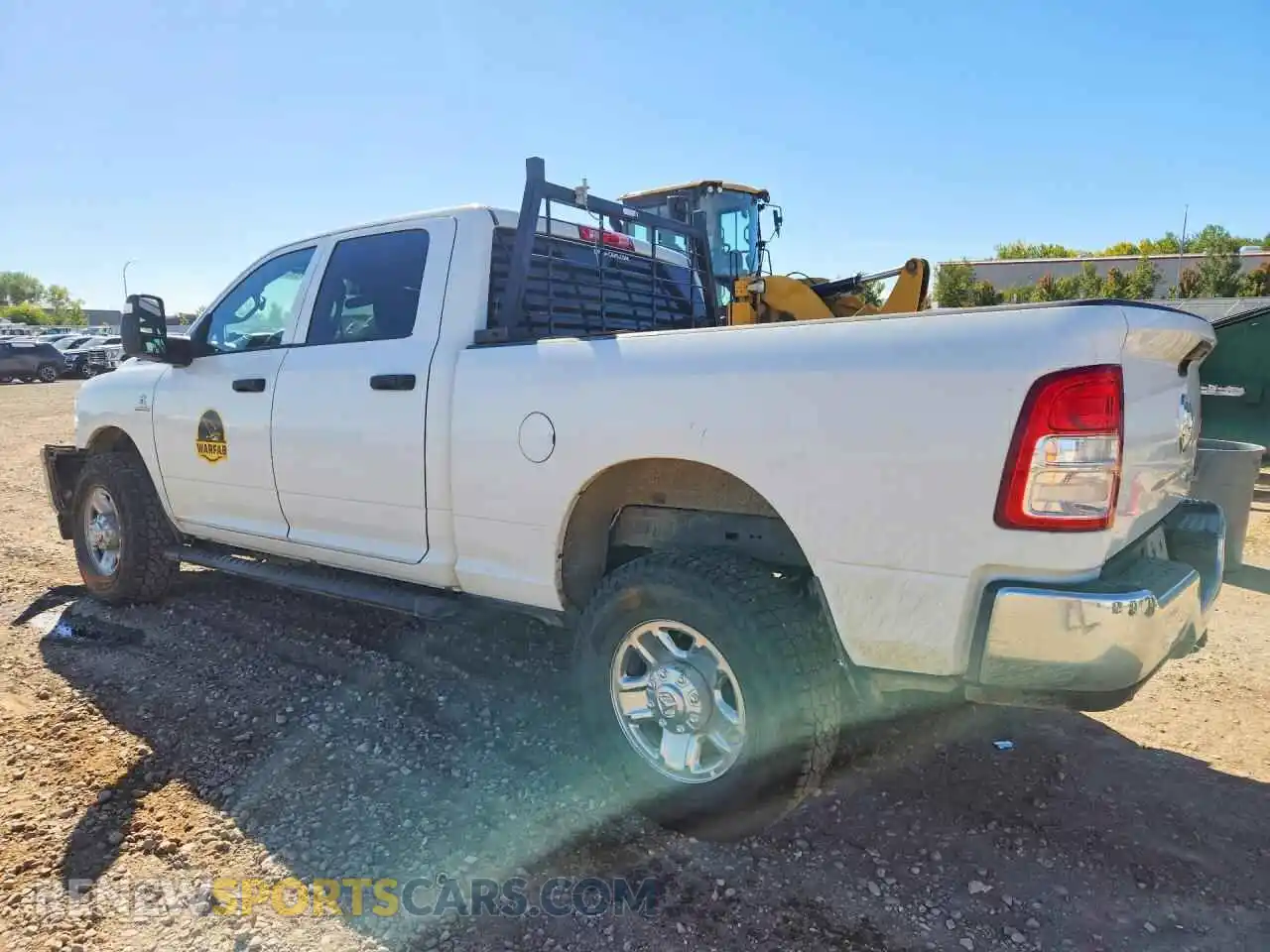 2 Photograph of a damaged car 3C6UR5CLXRG413828 RAM 2500 2024