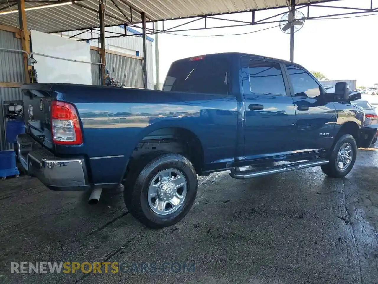3 Photograph of a damaged car 3C6UR5DJ0RG353426 RAM 2500 2024
