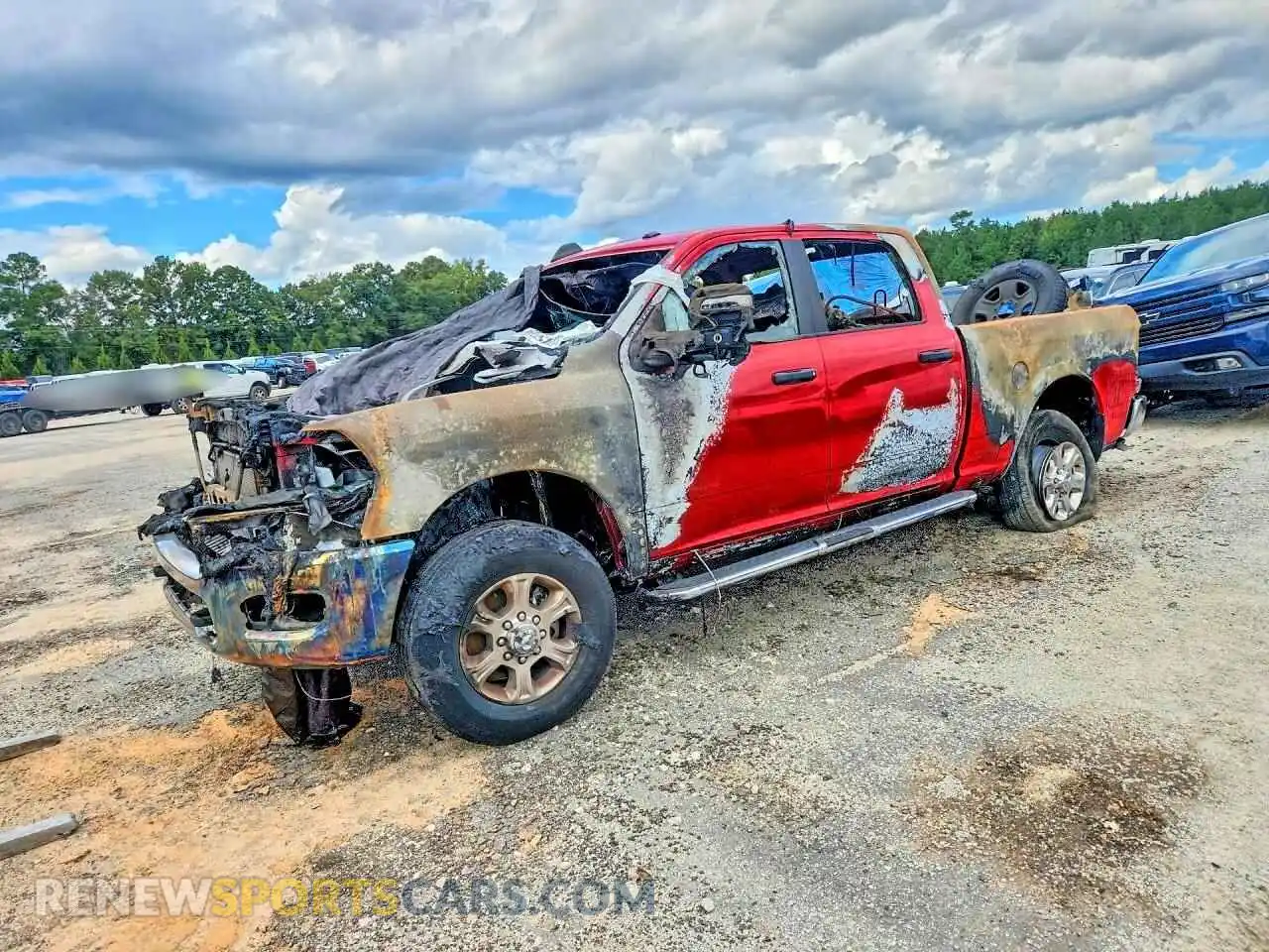 1 Photograph of a damaged car 3C6UR5DJ0RG386507 RAM 2500 2024