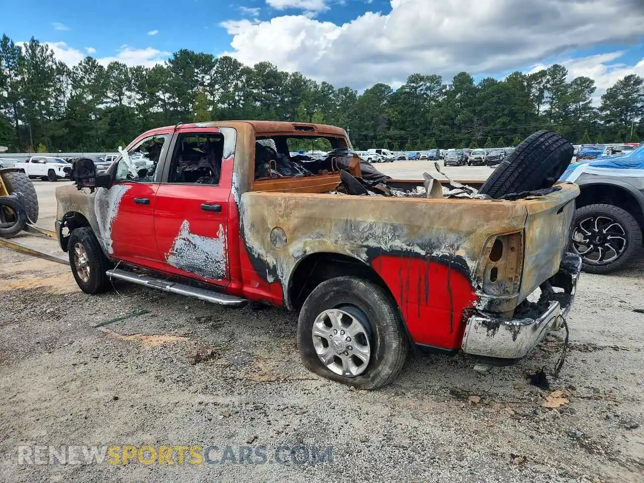 2 Photograph of a damaged car 3C6UR5DJ0RG386507 RAM 2500 2024