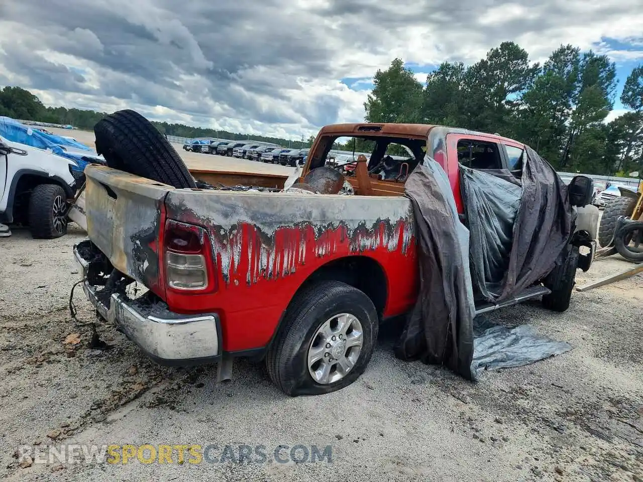 3 Photograph of a damaged car 3C6UR5DJ0RG386507 RAM 2500 2024