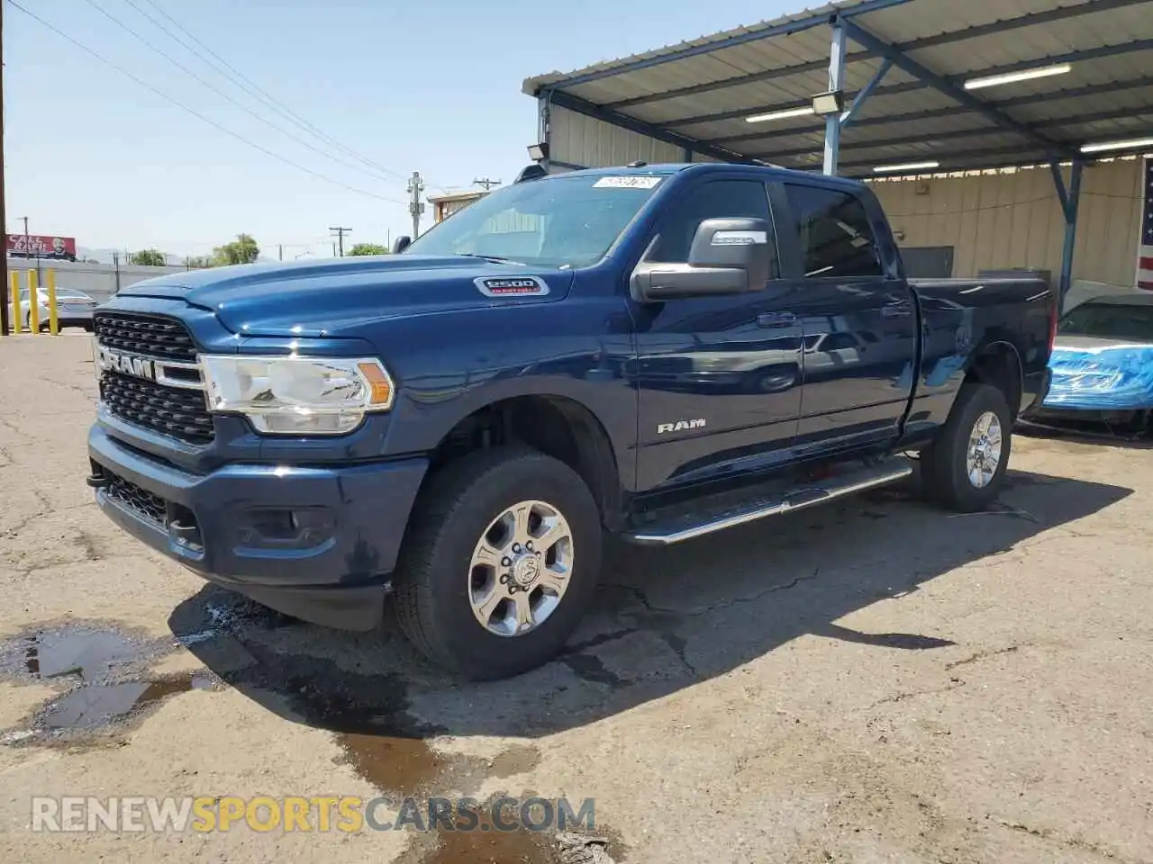 1 Photograph of a damaged car 3C6UR5DJ0RG397572 RAM 2500 2024