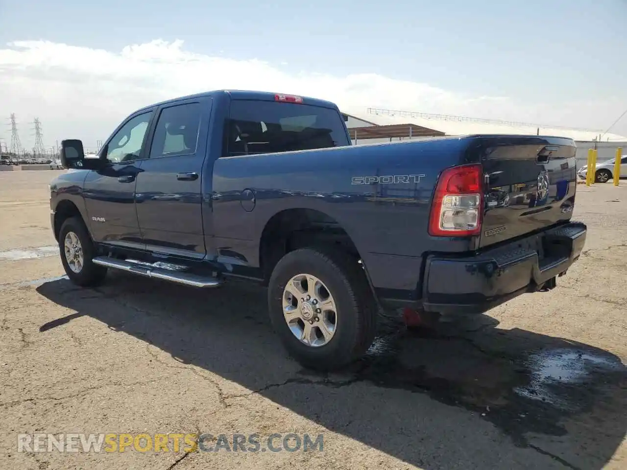 2 Photograph of a damaged car 3C6UR5DJ0RG397572 RAM 2500 2024