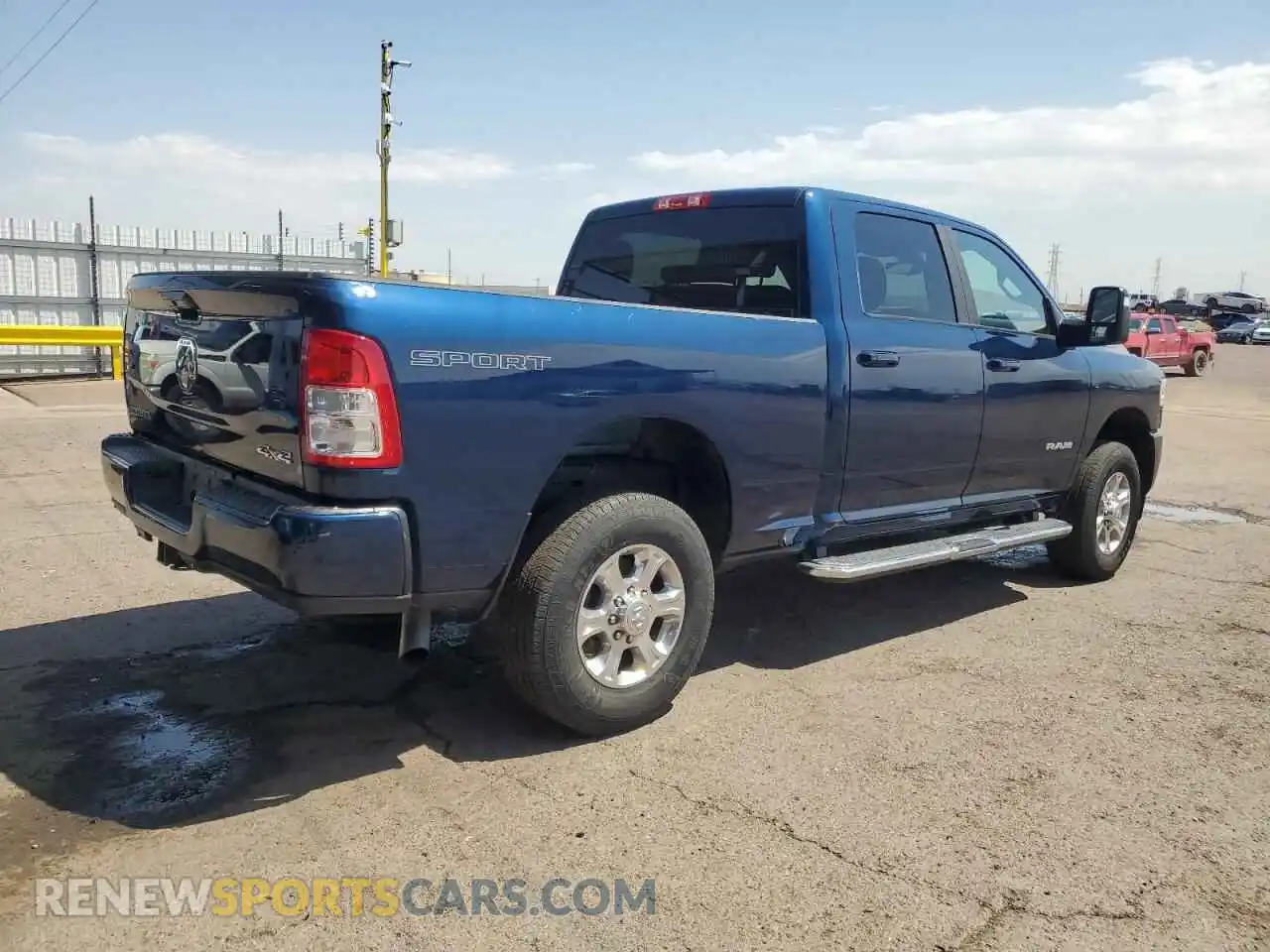3 Photograph of a damaged car 3C6UR5DJ0RG397572 RAM 2500 2024
