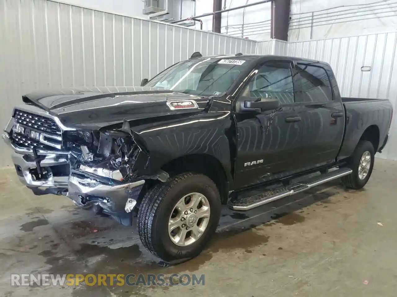 1 Photograph of a damaged car 3C6UR5DJ0RG400129 RAM 2500 2024