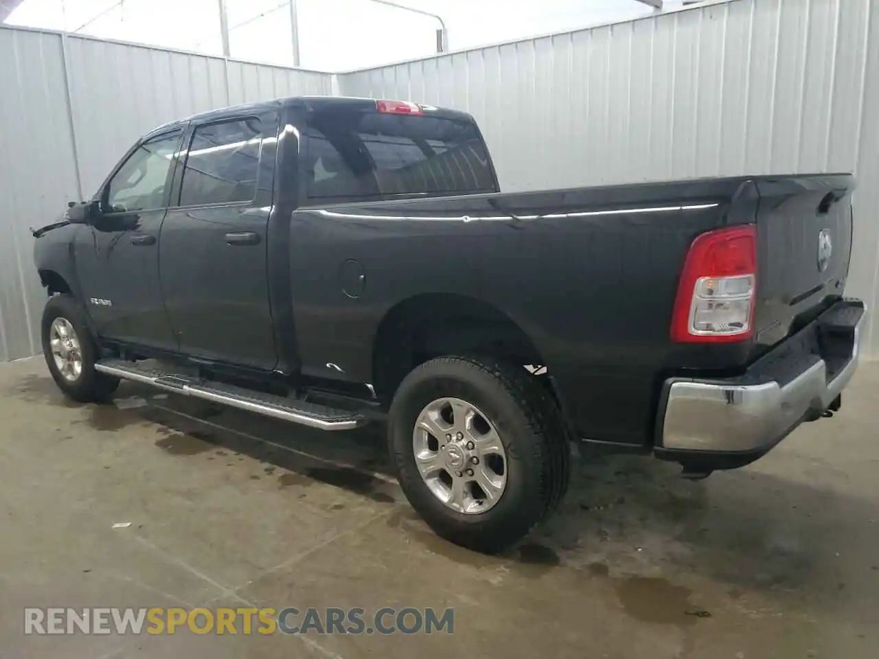 2 Photograph of a damaged car 3C6UR5DJ0RG400129 RAM 2500 2024