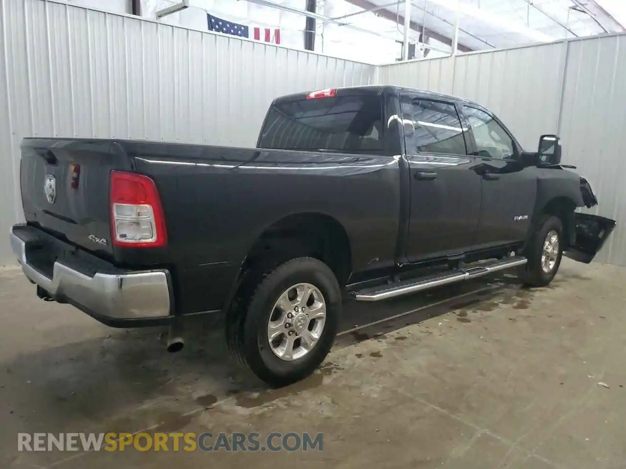 3 Photograph of a damaged car 3C6UR5DJ0RG400129 RAM 2500 2024