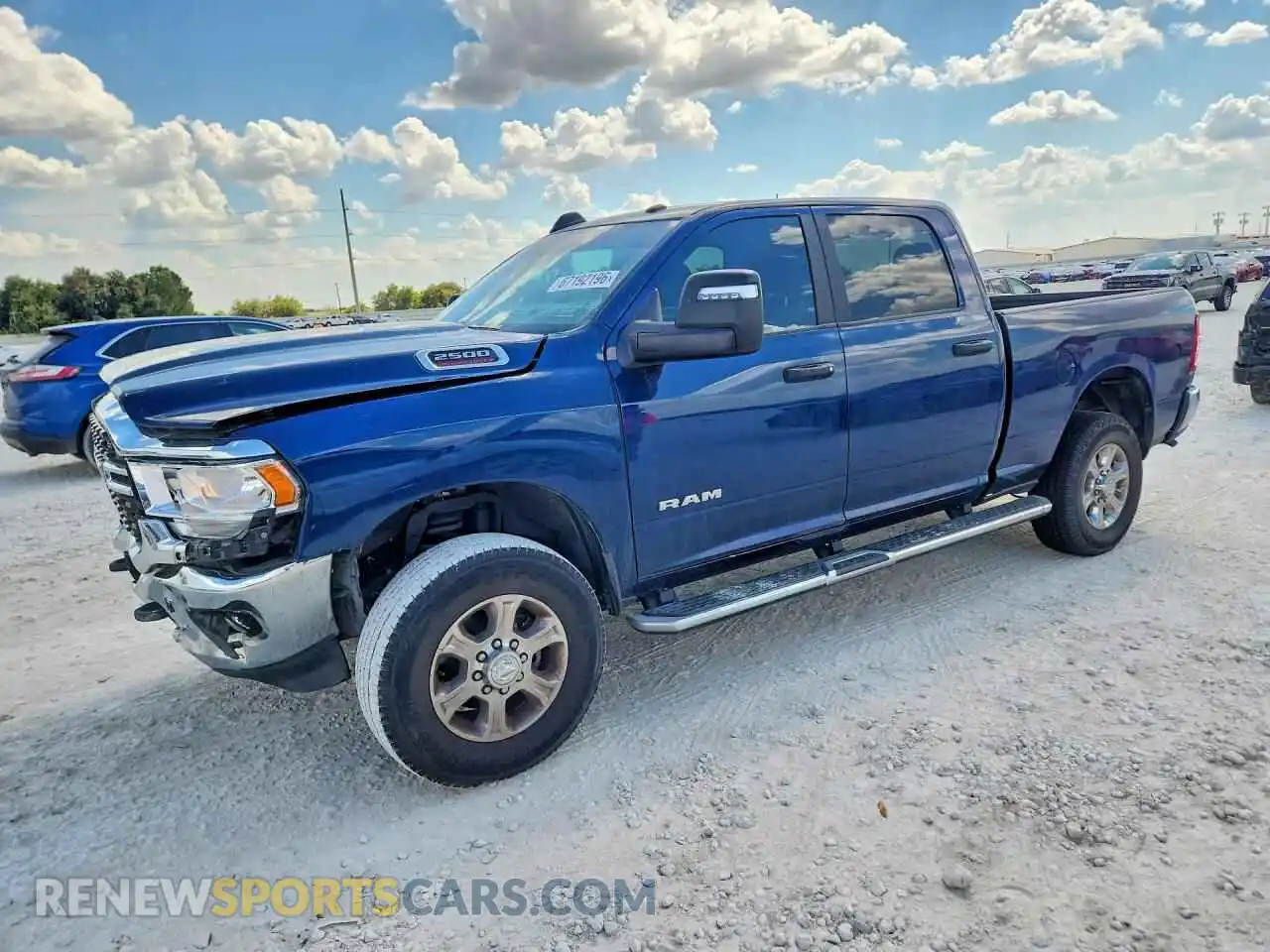 1 Photograph of a damaged car 3C6UR5DJ1RG322427 RAM 2500 2024