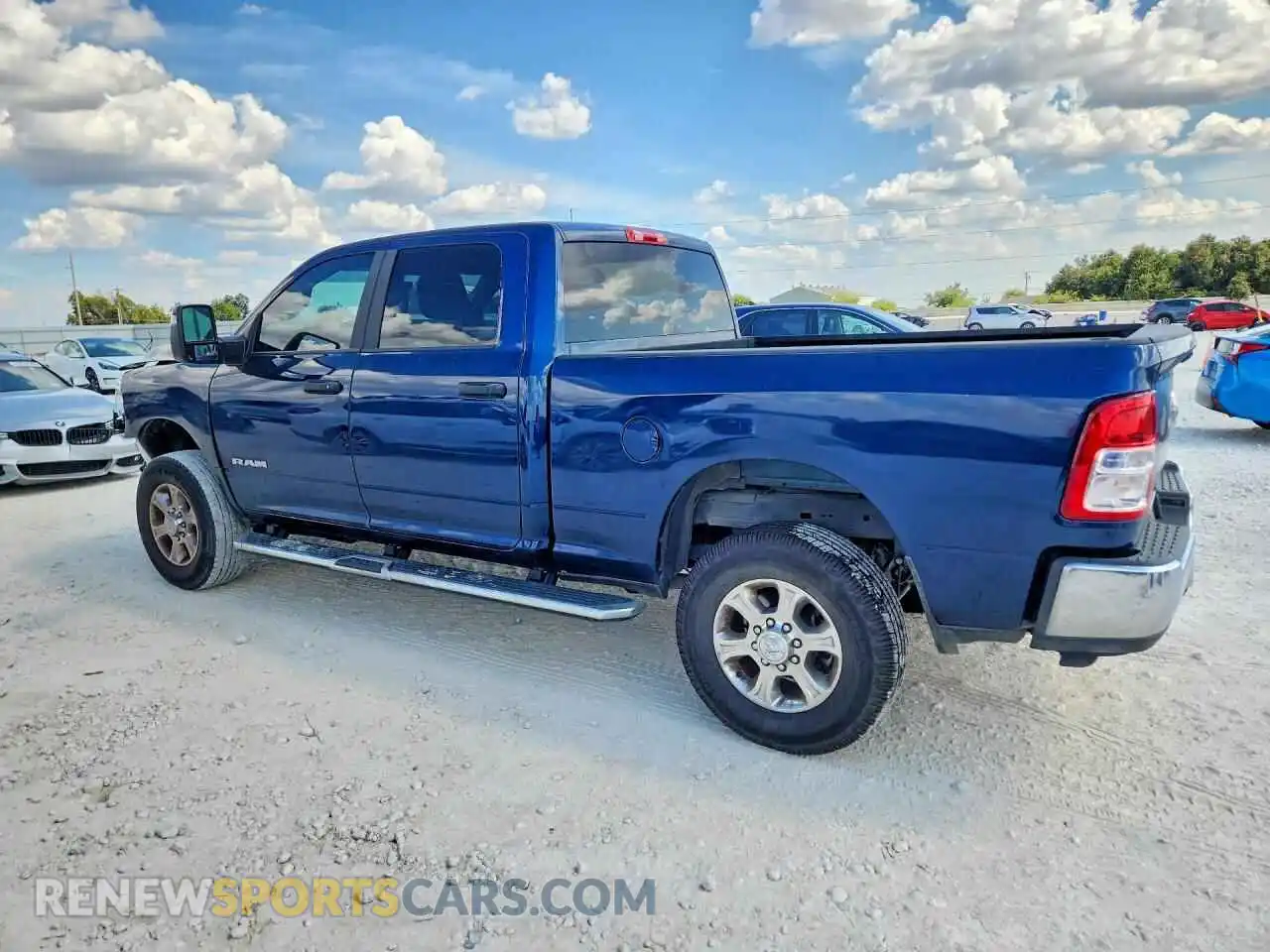 2 Photograph of a damaged car 3C6UR5DJ1RG322427 RAM 2500 2024