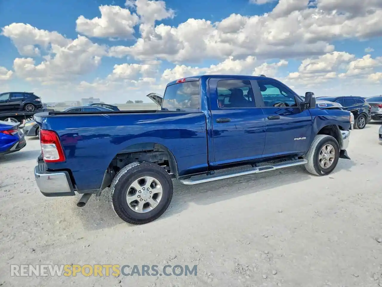 3 Photograph of a damaged car 3C6UR5DJ1RG322427 RAM 2500 2024
