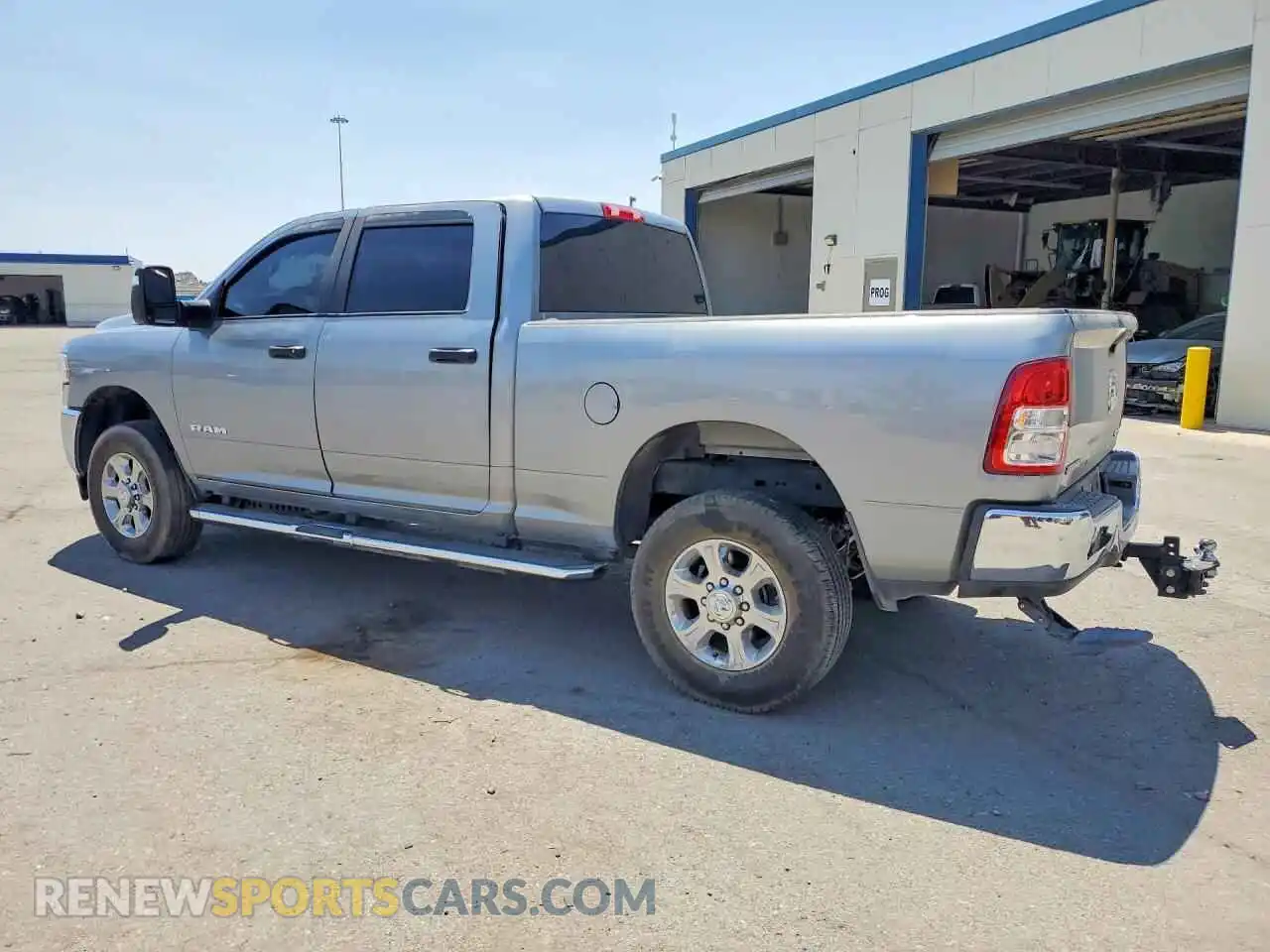2 Photograph of a damaged car 3C6UR5DJ1RG323559 RAM 2500 2024
