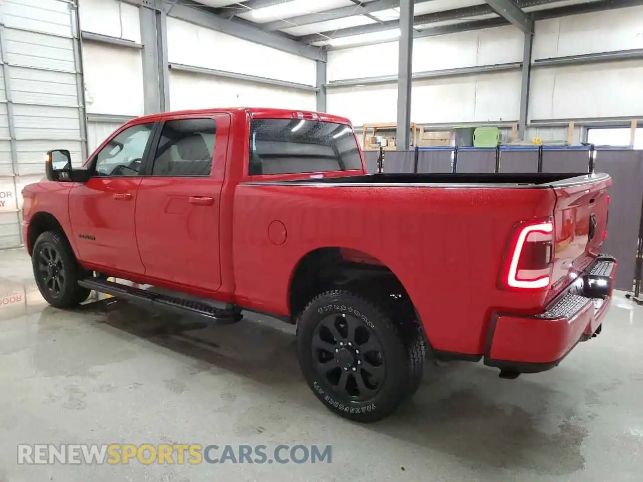 2 Photograph of a damaged car 3C6UR5DJ1RG397502 RAM 2500 2024