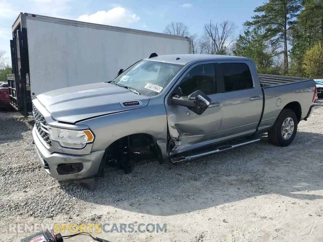 1 Photograph of a damaged car 3C6UR5DJ1RG401063 RAM 2500 2024