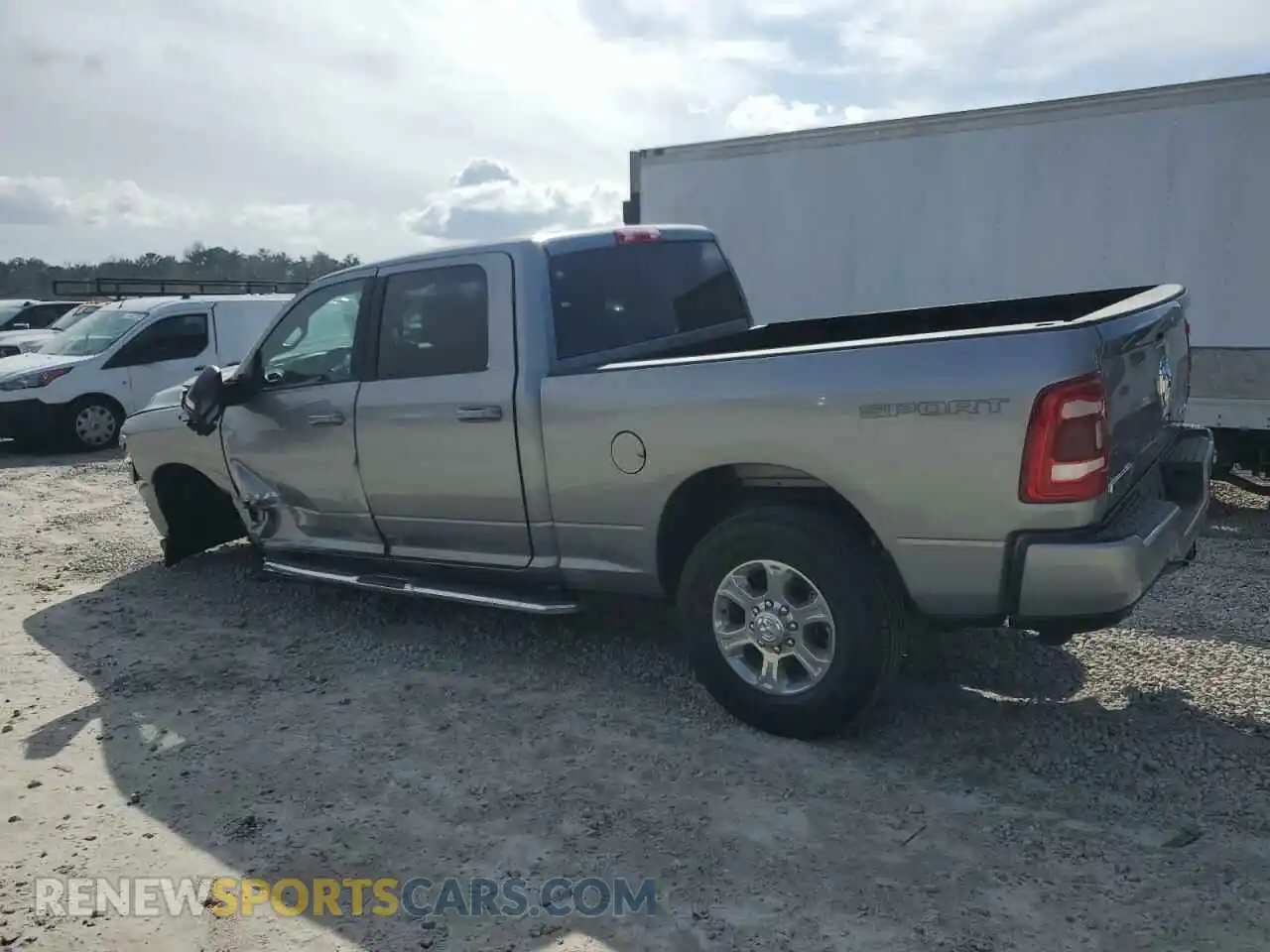 2 Photograph of a damaged car 3C6UR5DJ1RG401063 RAM 2500 2024