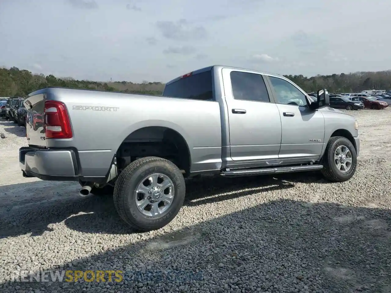 3 Photograph of a damaged car 3C6UR5DJ1RG401063 RAM 2500 2024