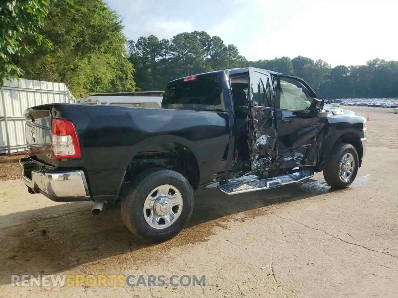 3 Photograph of a damaged car 3C6UR5DJ2RG348373 RAM 2500 2024