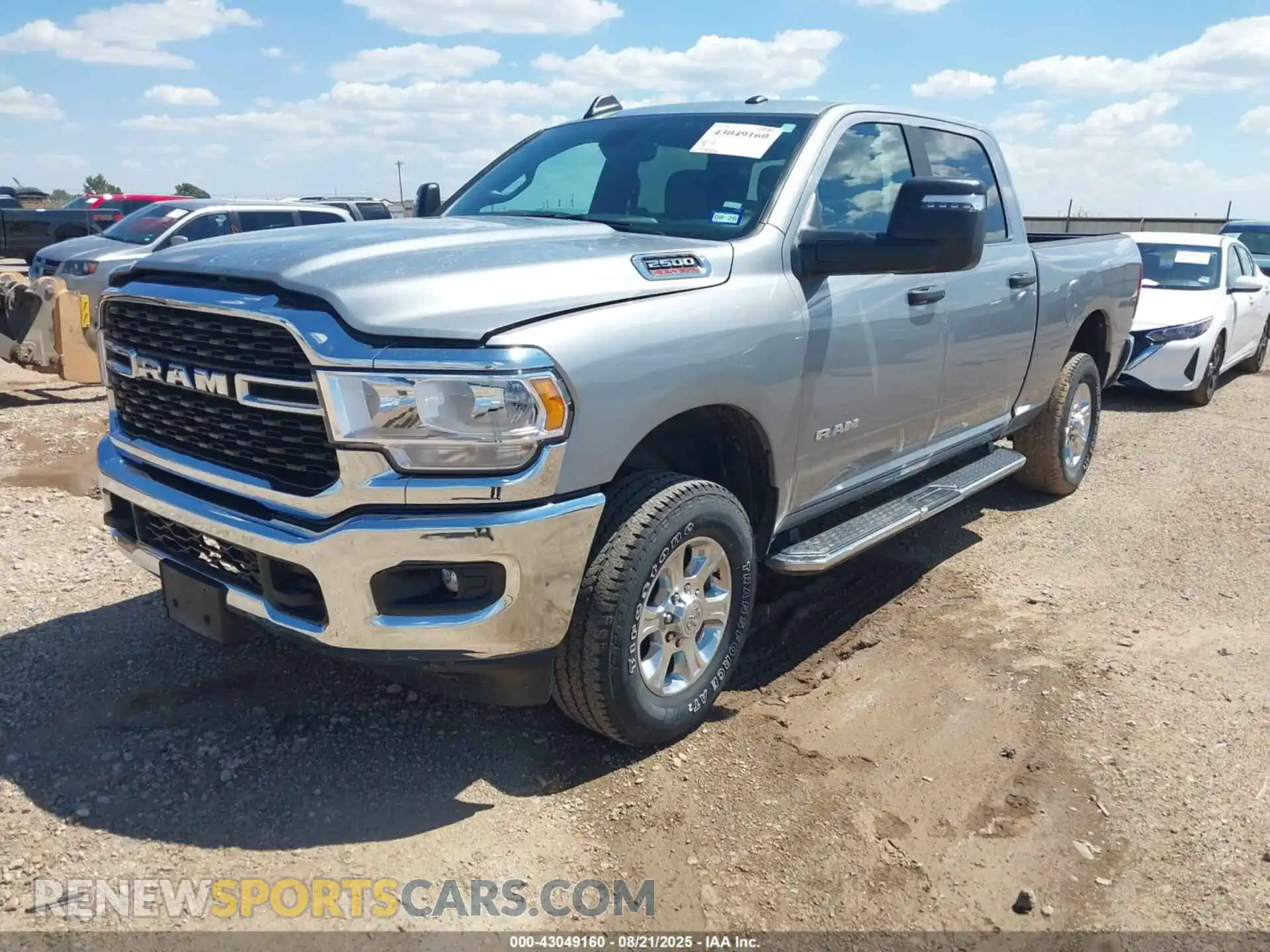 2 Photograph of a damaged car 3C6UR5DJ2RG366548 RAM 2500 2024