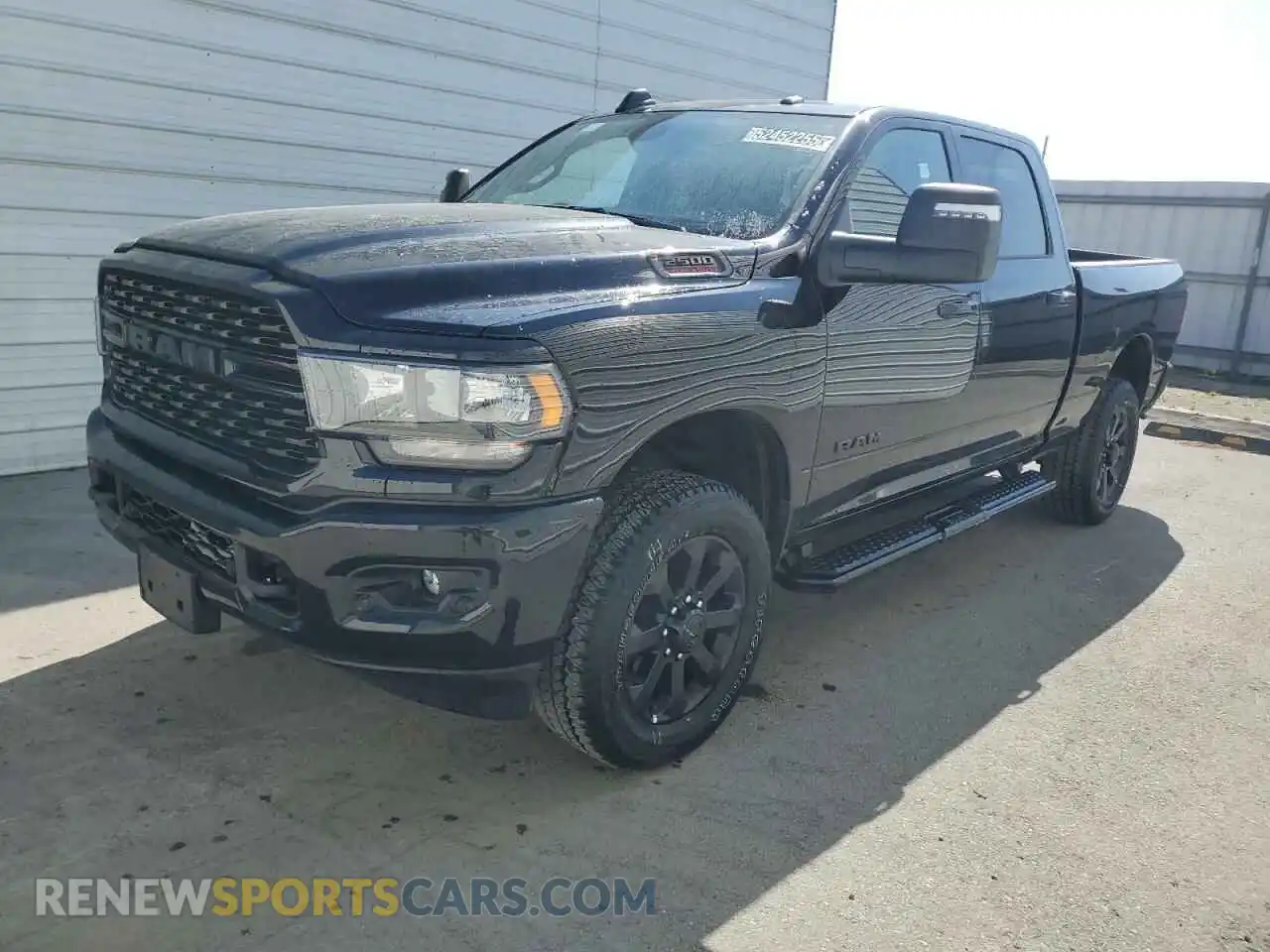 1 Photograph of a damaged car 3C6UR5DJ2RG383222 RAM 2500 2024