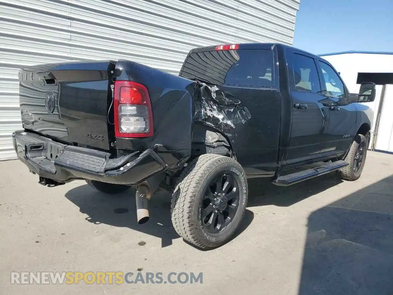 3 Photograph of a damaged car 3C6UR5DJ2RG383222 RAM 2500 2024