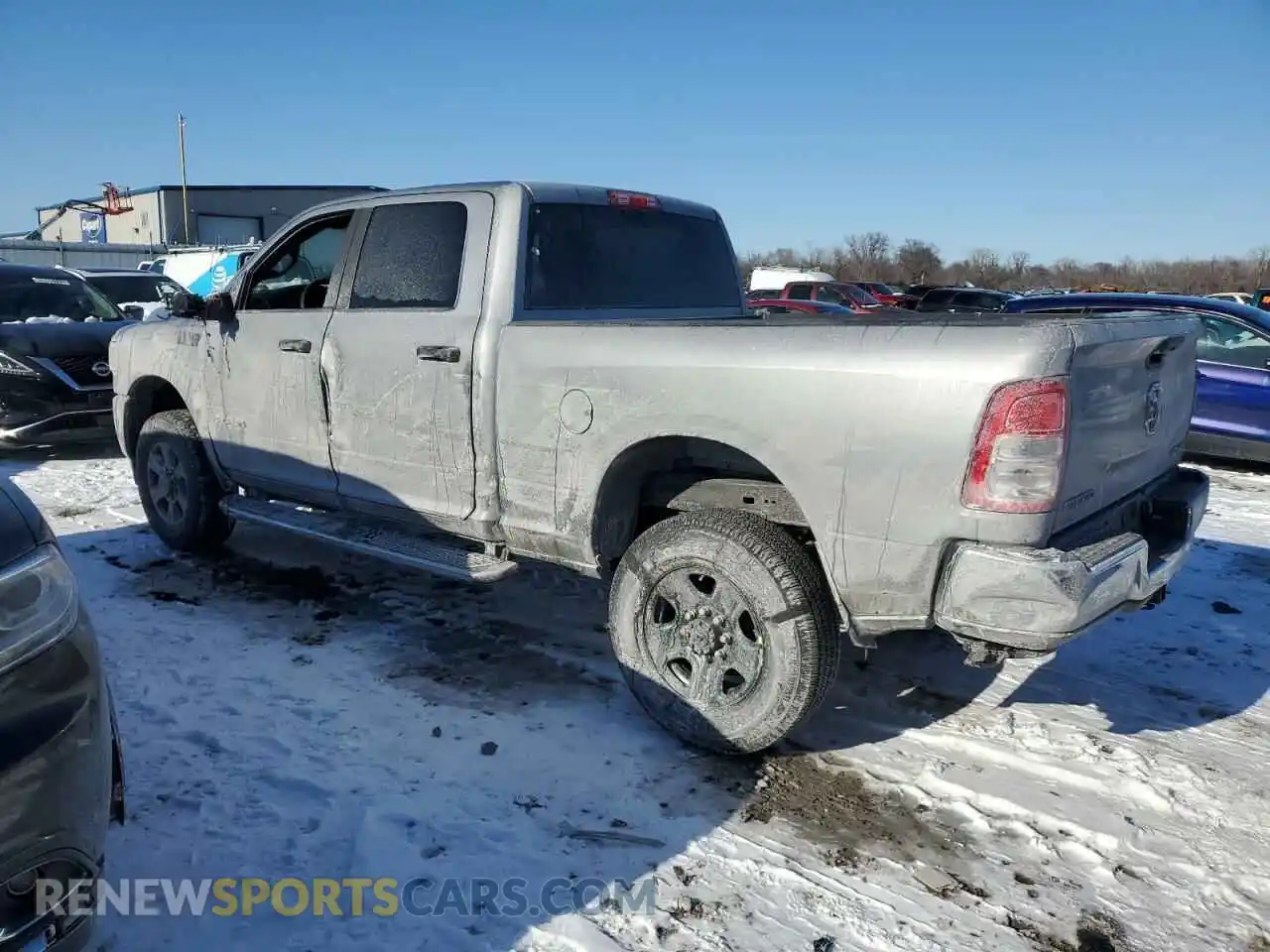 2 Photograph of a damaged car 3C6UR5DJ2RG386072 RAM 2500 2024