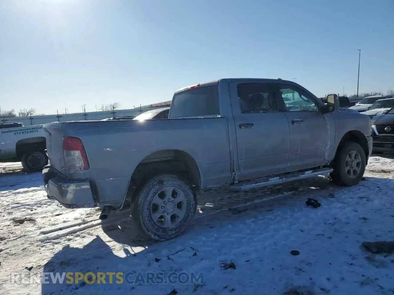 3 Photograph of a damaged car 3C6UR5DJ2RG386072 RAM 2500 2024