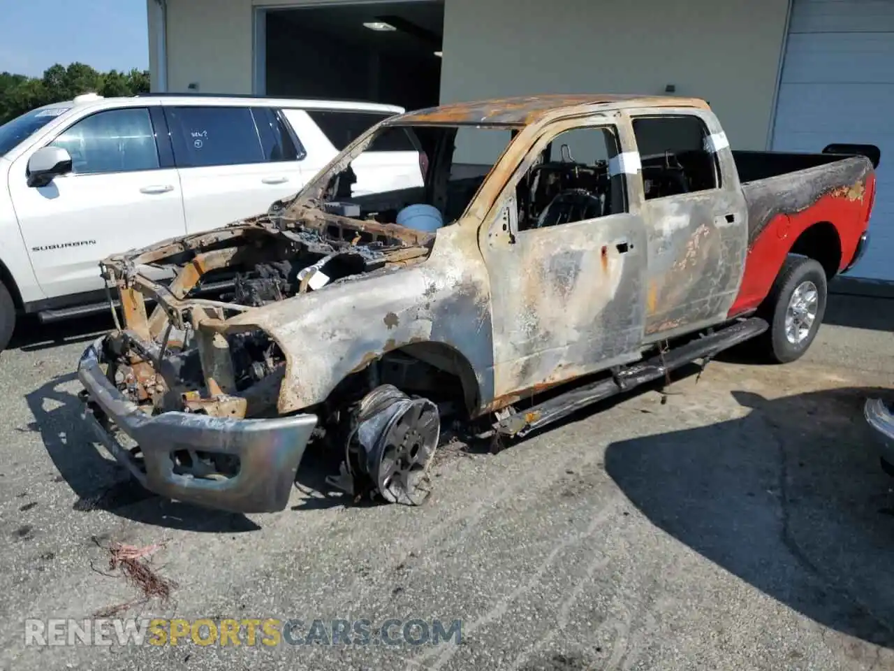 1 Photograph of a damaged car 3C6UR5DJ3RG323613 RAM 2500 2024