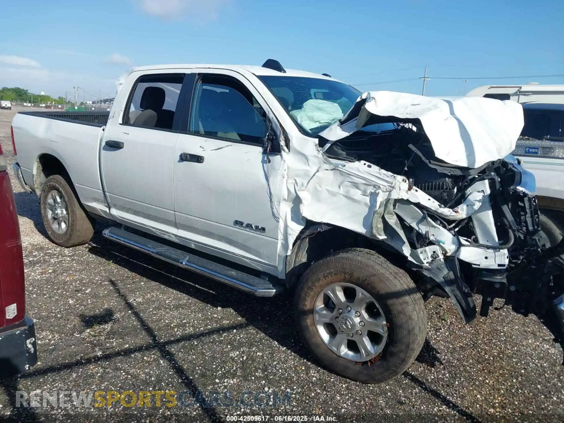 1 Photograph of a damaged car 3C6UR5DJ3RG366512 RAM 2500 2024