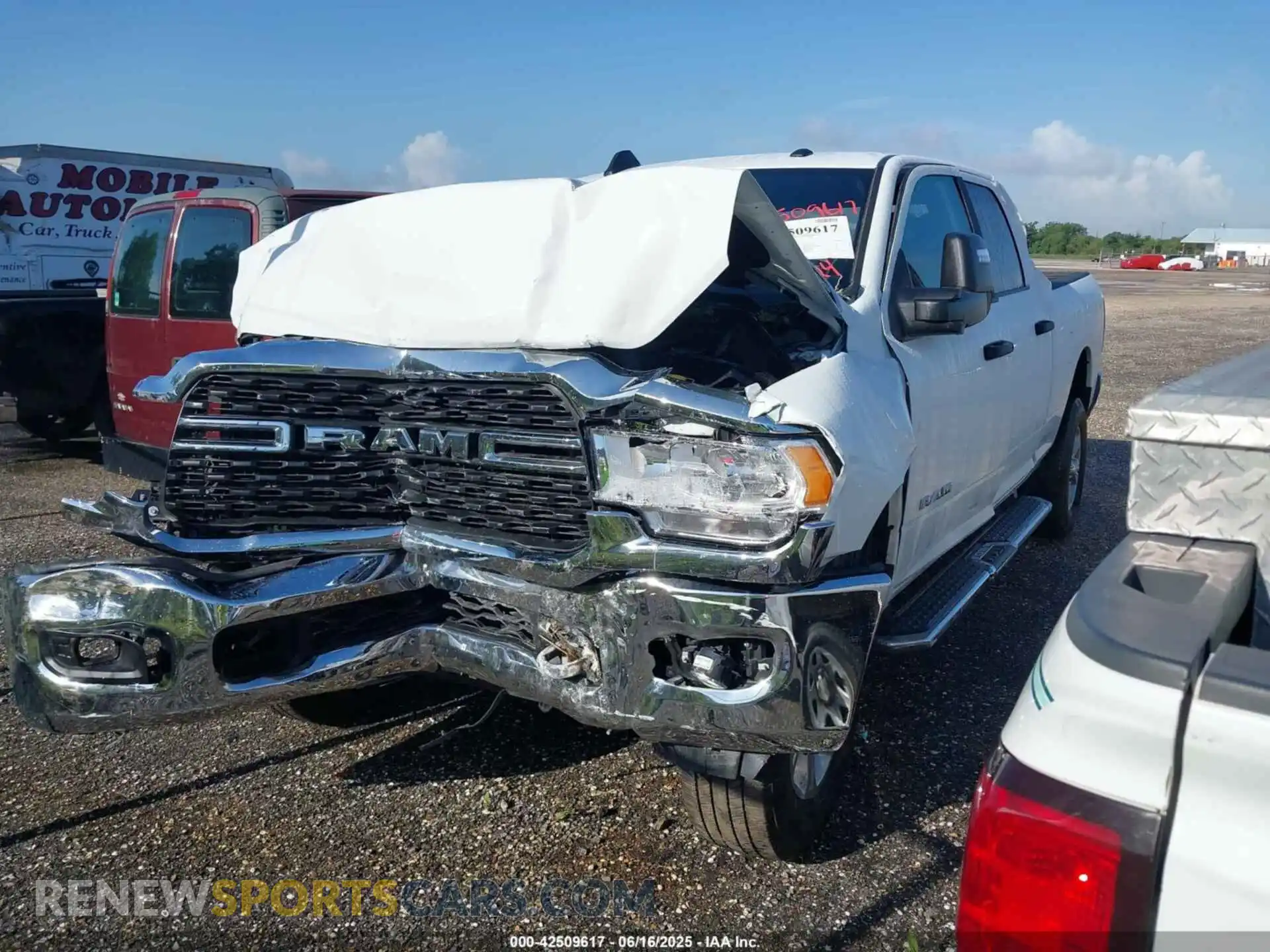 2 Photograph of a damaged car 3C6UR5DJ3RG366512 RAM 2500 2024