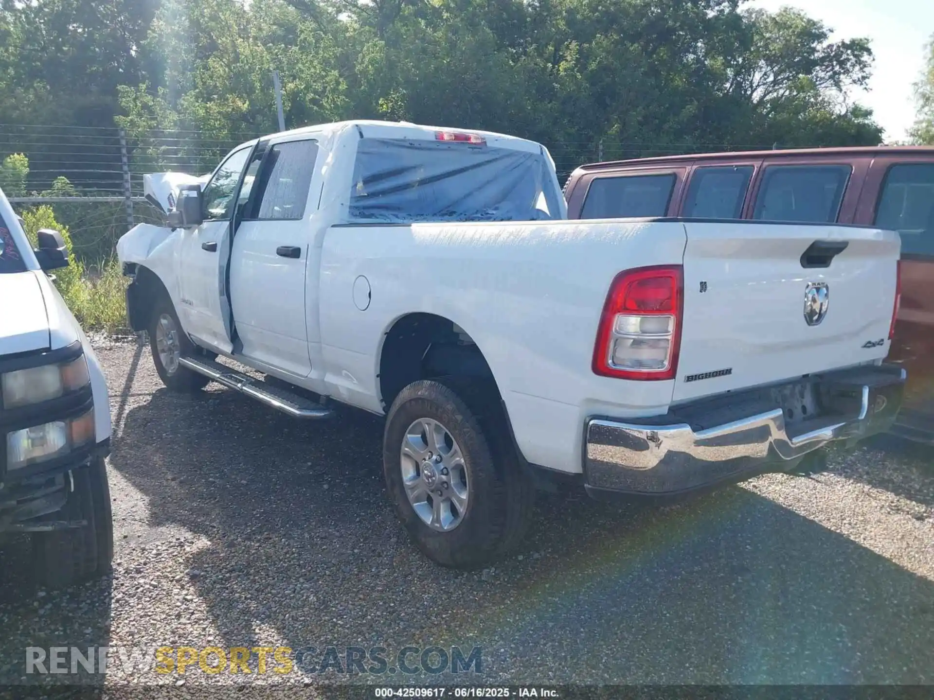 3 Photograph of a damaged car 3C6UR5DJ3RG366512 RAM 2500 2024
