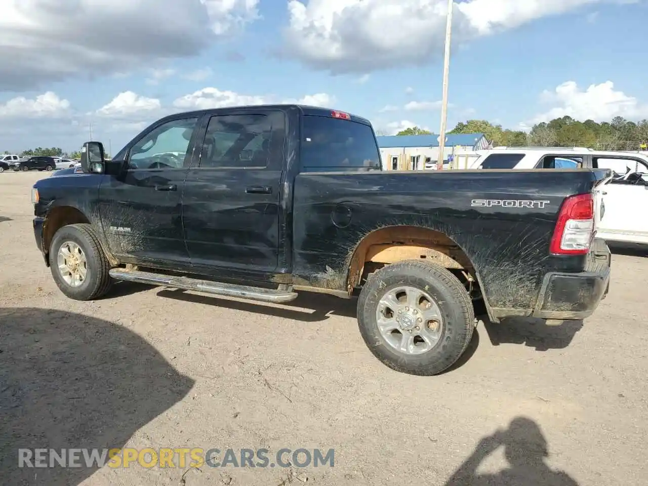 2 Photograph of a damaged car 3C6UR5DJ3RG372682 RAM 2500 2024