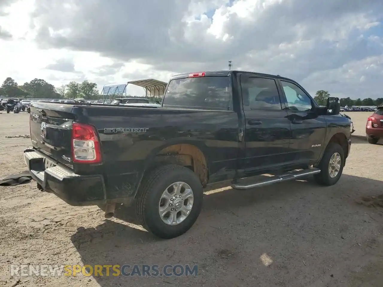 3 Photograph of a damaged car 3C6UR5DJ3RG372682 RAM 2500 2024