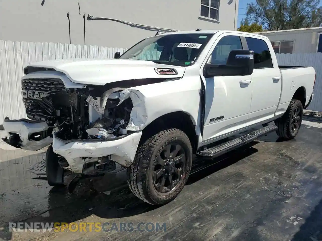 1 Photograph of a damaged car 3C6UR5DJ3RG380541 RAM 2500 2024