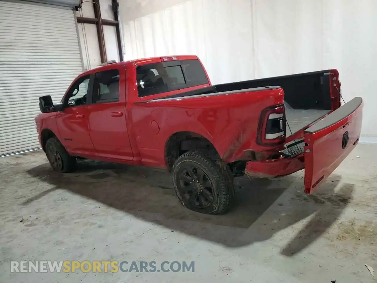 2 Photograph of a damaged car 3C6UR5DJ3RG382760 RAM 2500 2024