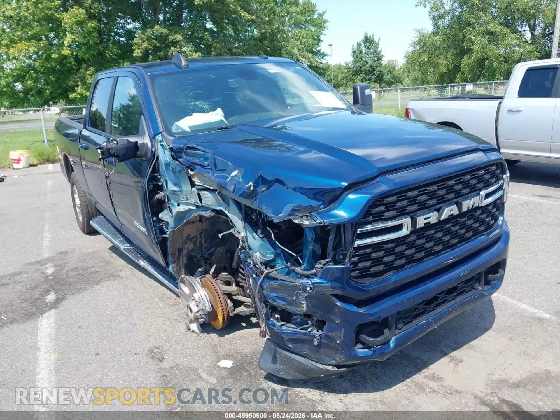 1 Photograph of a damaged car 3C6UR5DJ3RG387621 RAM 2500 2024