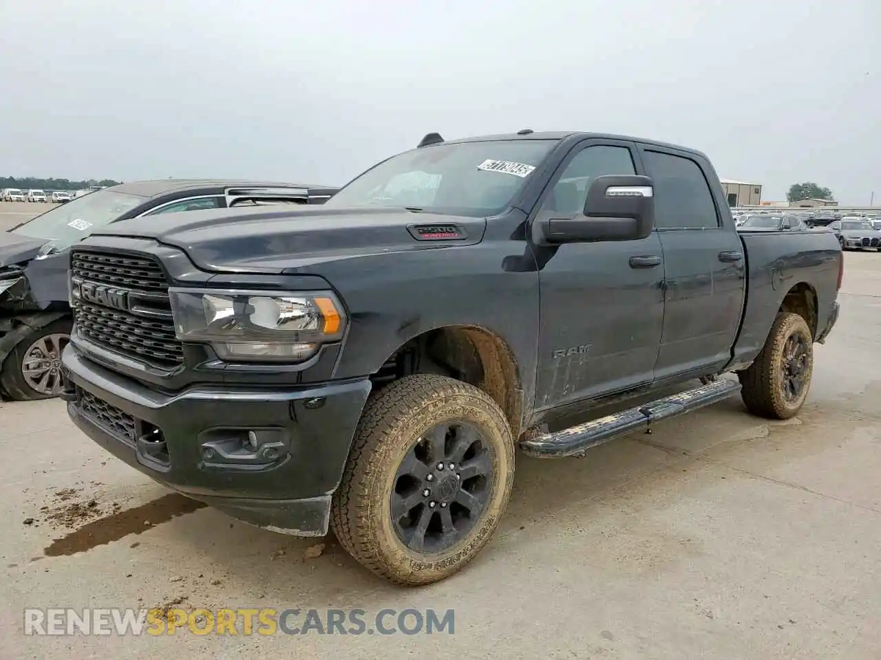 1 Photograph of a damaged car 3C6UR5DJ3RG397176 RAM 2500 2024