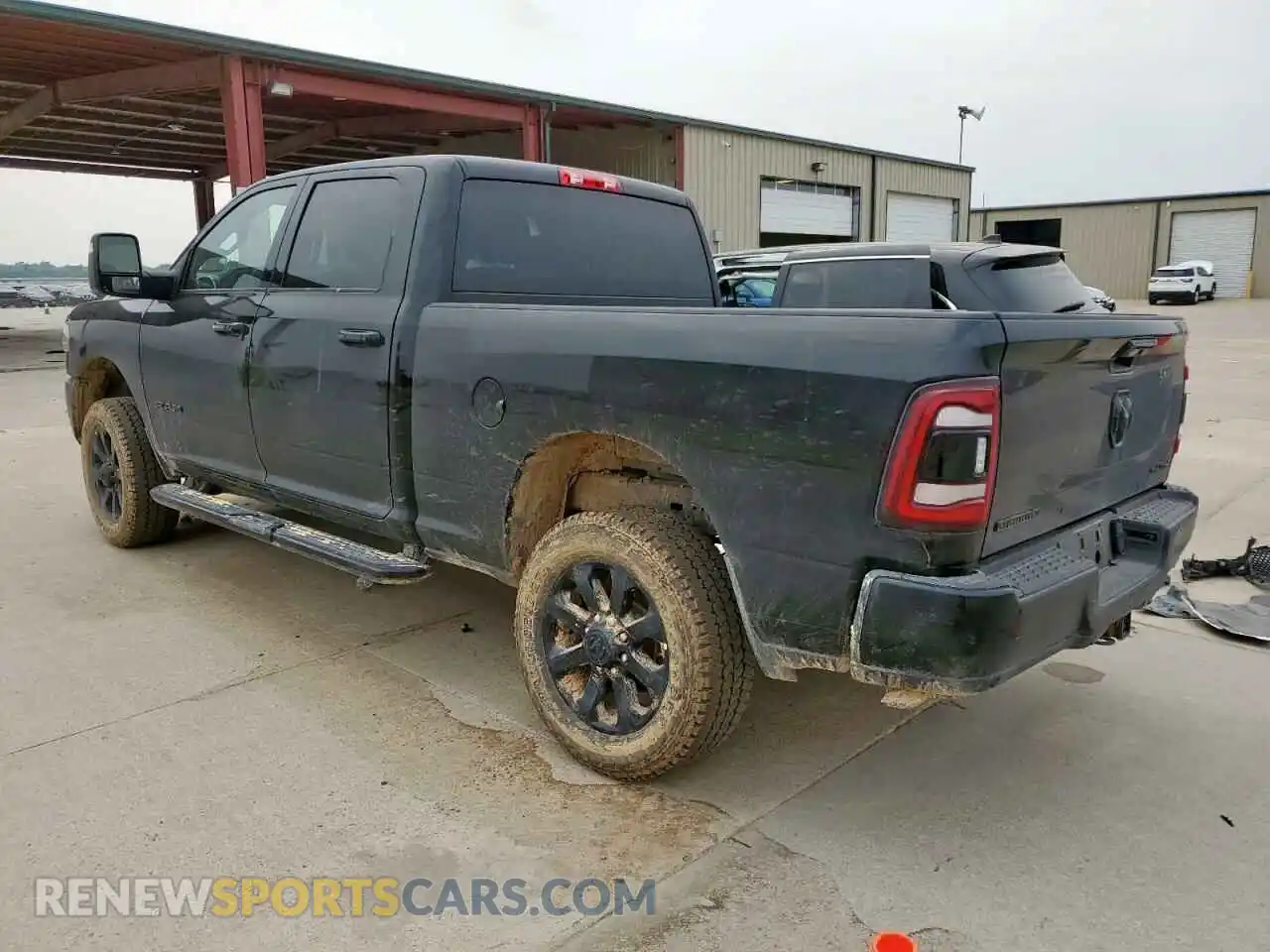 2 Photograph of a damaged car 3C6UR5DJ3RG397176 RAM 2500 2024