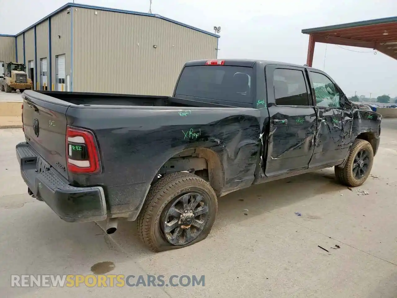 3 Photograph of a damaged car 3C6UR5DJ3RG397176 RAM 2500 2024