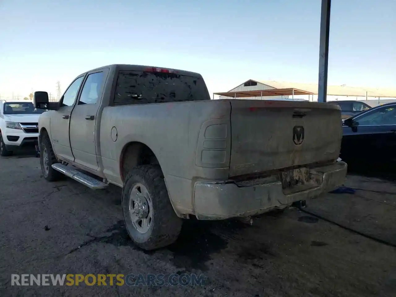 3 Photograph of a damaged car 3C6UR5DJ4RG354207 RAM 2500 2024