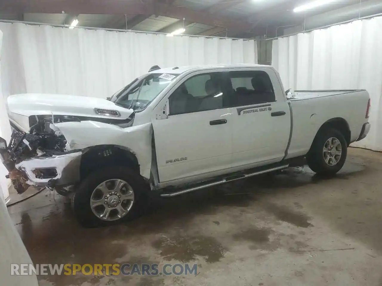 1 Photograph of a damaged car 3C6UR5DJ5RG302956 RAM 2500 2024