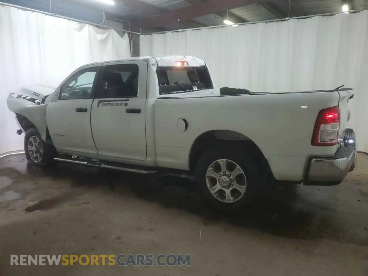 2 Photograph of a damaged car 3C6UR5DJ5RG302956 RAM 2500 2024