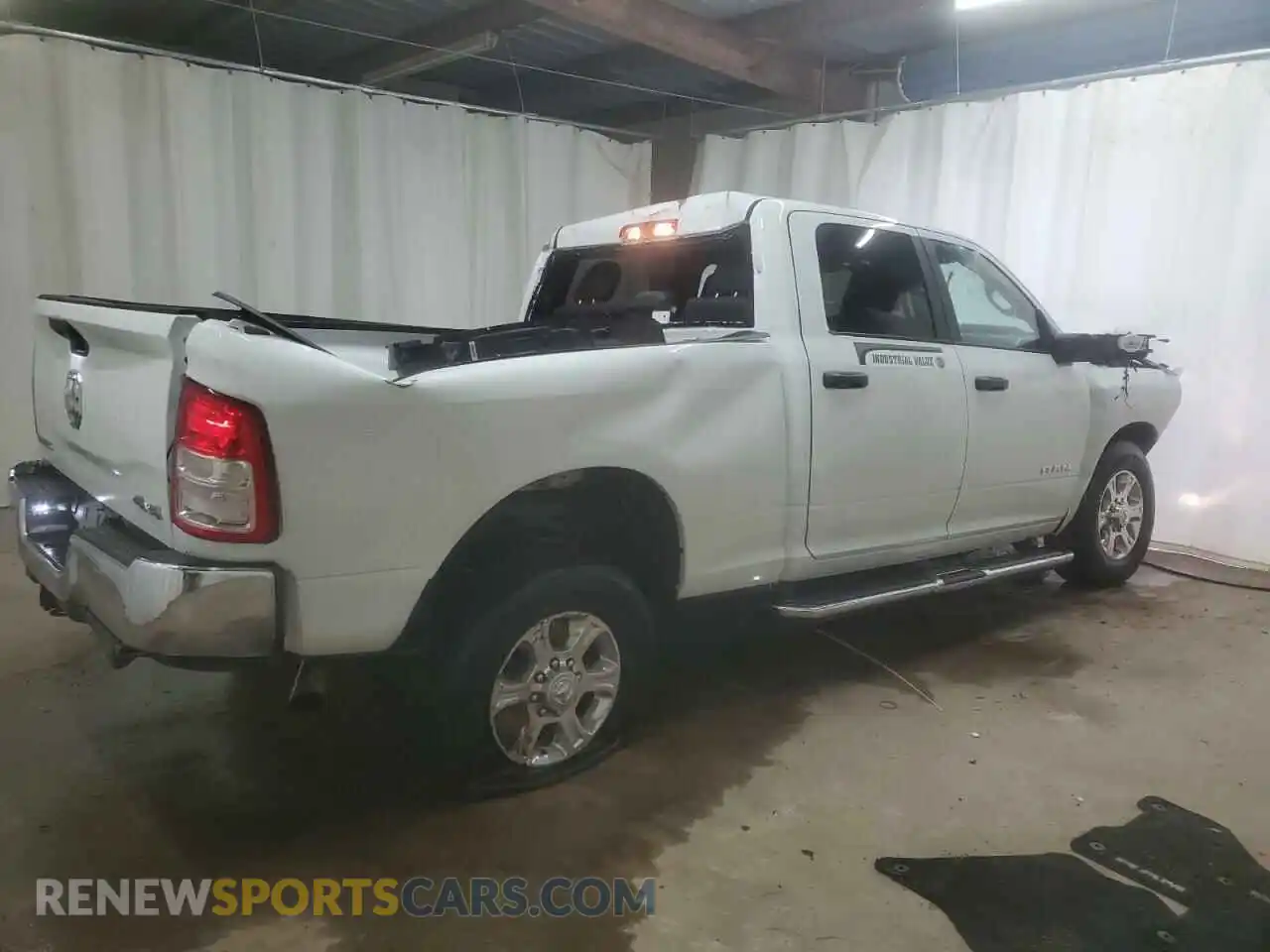 3 Photograph of a damaged car 3C6UR5DJ5RG302956 RAM 2500 2024
