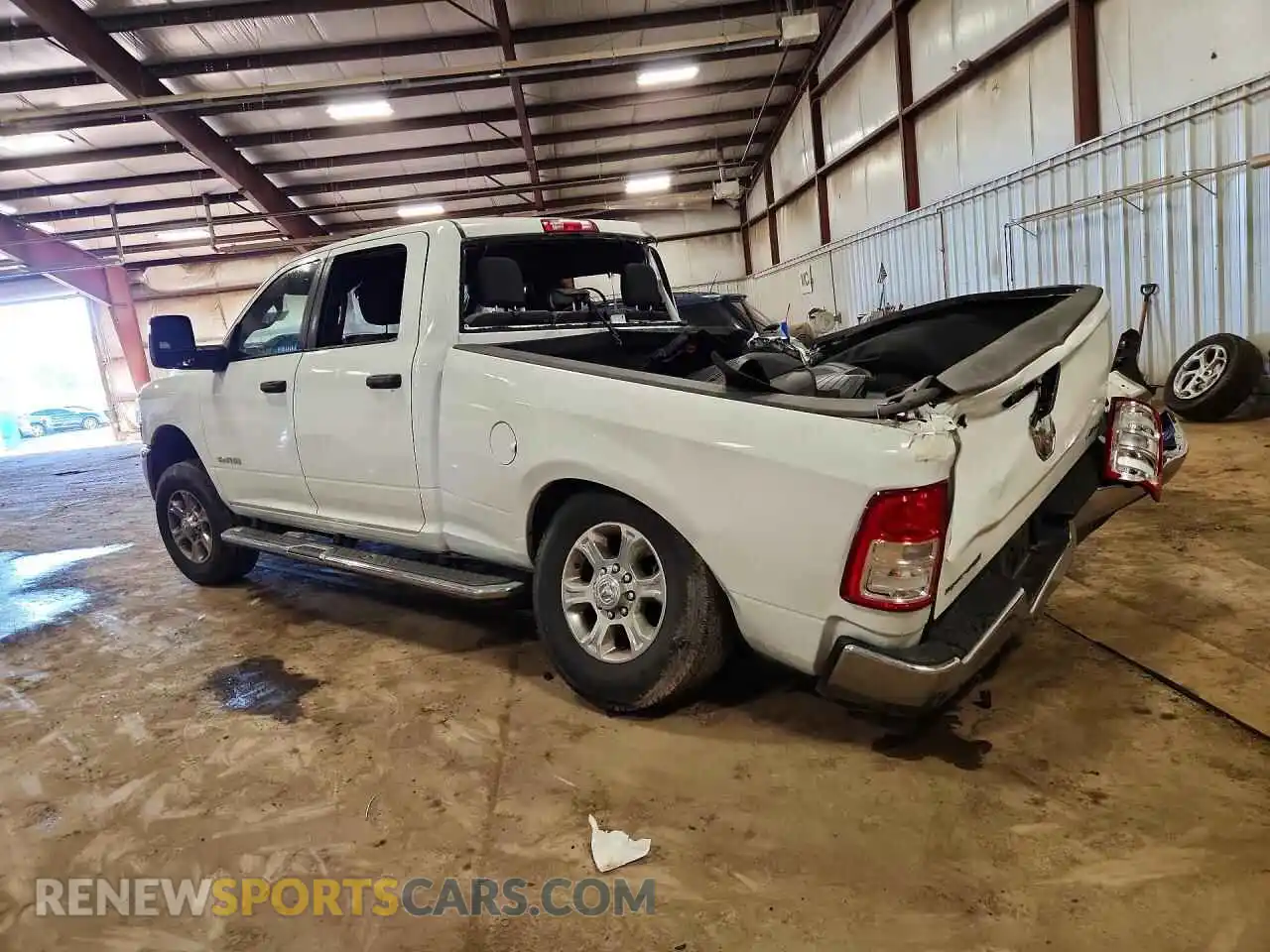 2 Photograph of a damaged car 3C6UR5DJ5RG322835 RAM 2500 2024