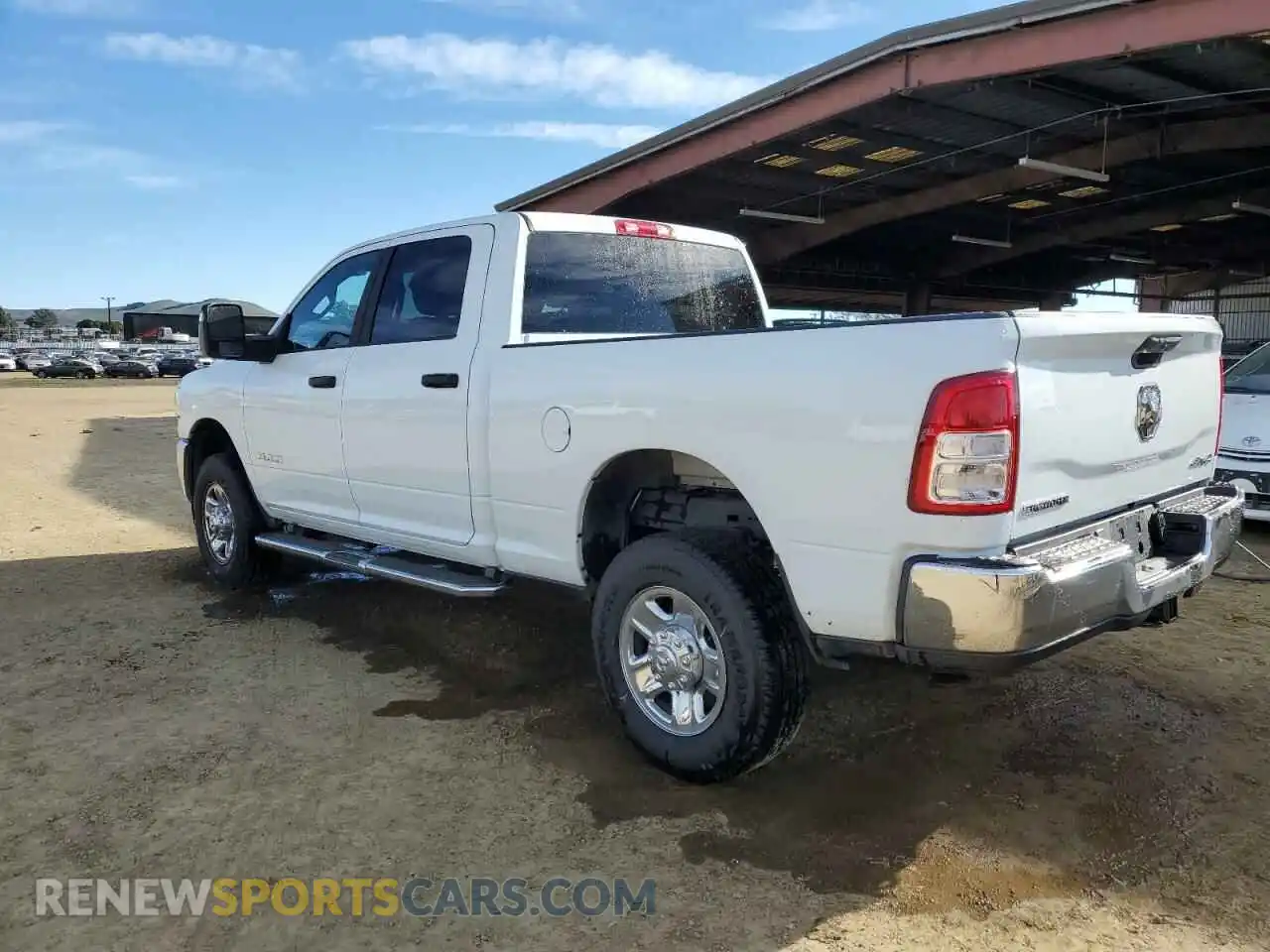 2 Photograph of a damaged car 3C6UR5DJ5RG341921 RAM 2500 2024