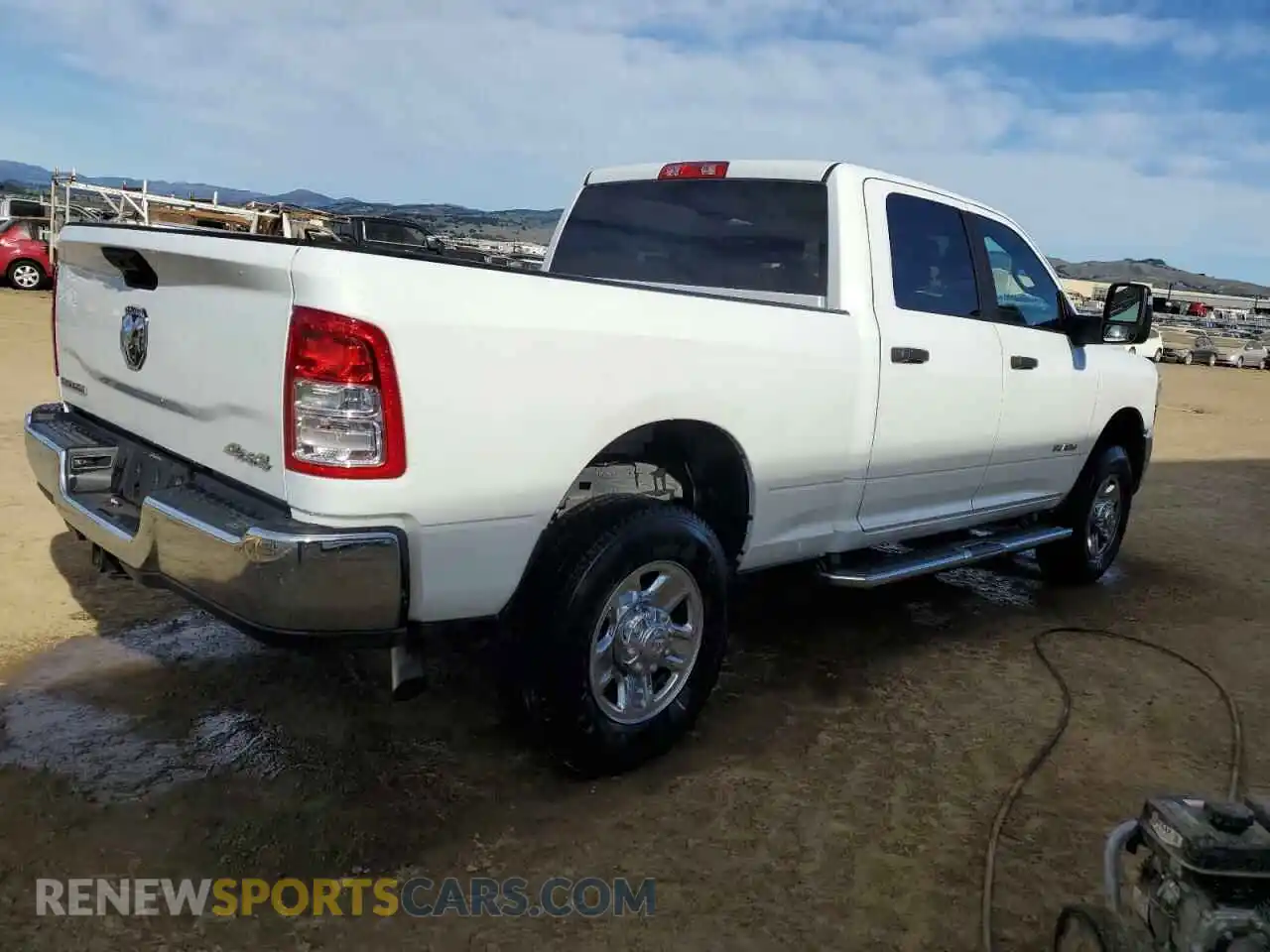 3 Photograph of a damaged car 3C6UR5DJ5RG341921 RAM 2500 2024