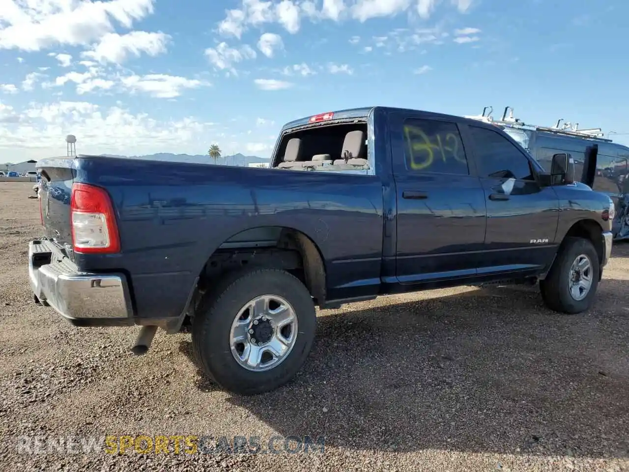 3 Photograph of a damaged car 3C6UR5DJ5RG342678 RAM 2500 2024