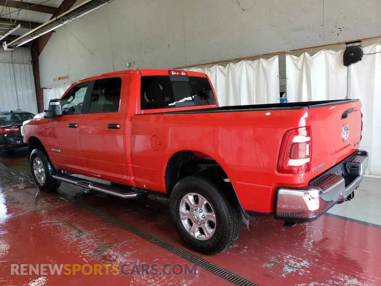 2 Photograph of a damaged car 3C6UR5DJ5RG382548 RAM 2500 2024