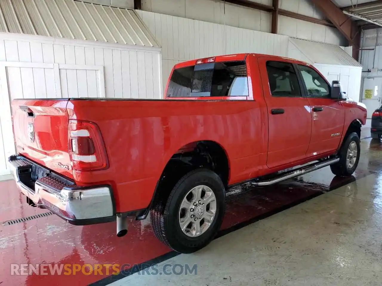 3 Photograph of a damaged car 3C6UR5DJ5RG382548 RAM 2500 2024